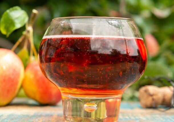bigstock-Glass-Of-Rose-Apple-Cider-From-388654810